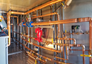 Copper Plumbing Pipe Installation at construction site